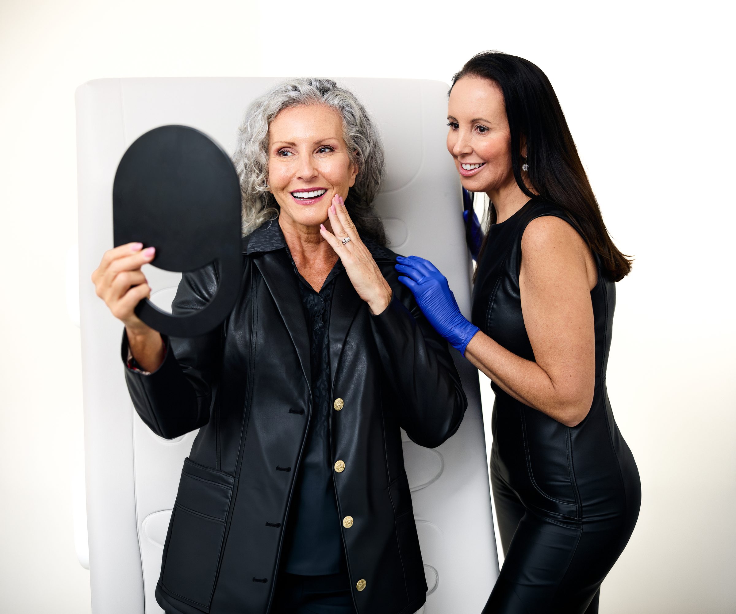 Rebecca Hoffey, aesthetic nurse specialist, with a patient during a consultation